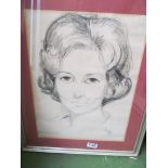 A charcoal portrait of a lady, signed