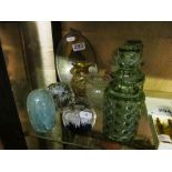 A pair of green glass scent bottles, and glass.