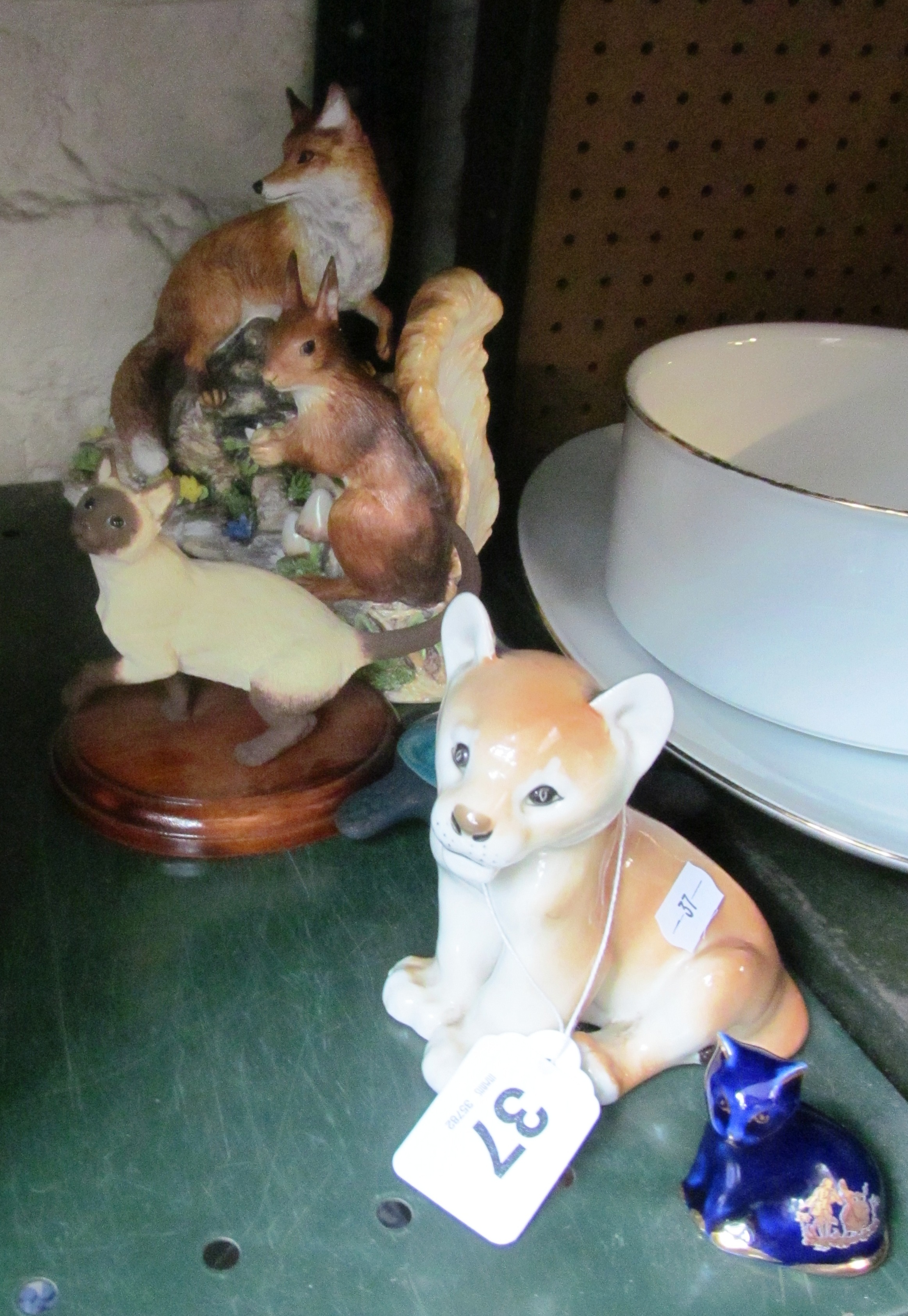 A USSR lion cub and a small group of other animal ornaments