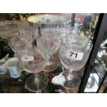 A set of eight ribbed design wine glasses