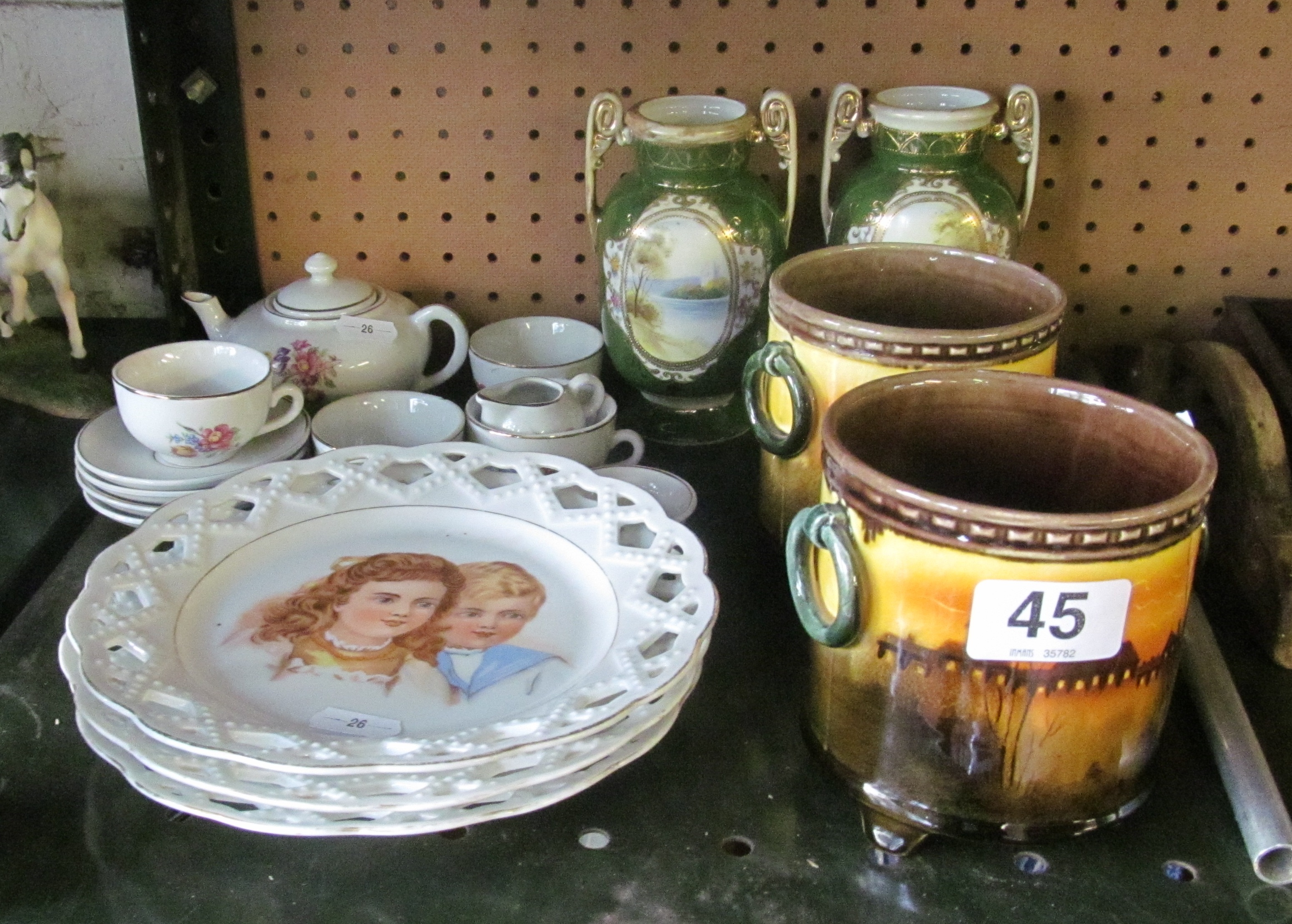 A pair Noritake vases with reserves of river scenes, pair of vases with ring handles, three