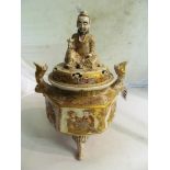 A late 19th Century Satsuma Koro with gentleman holding a flower seated to lid and scenes around