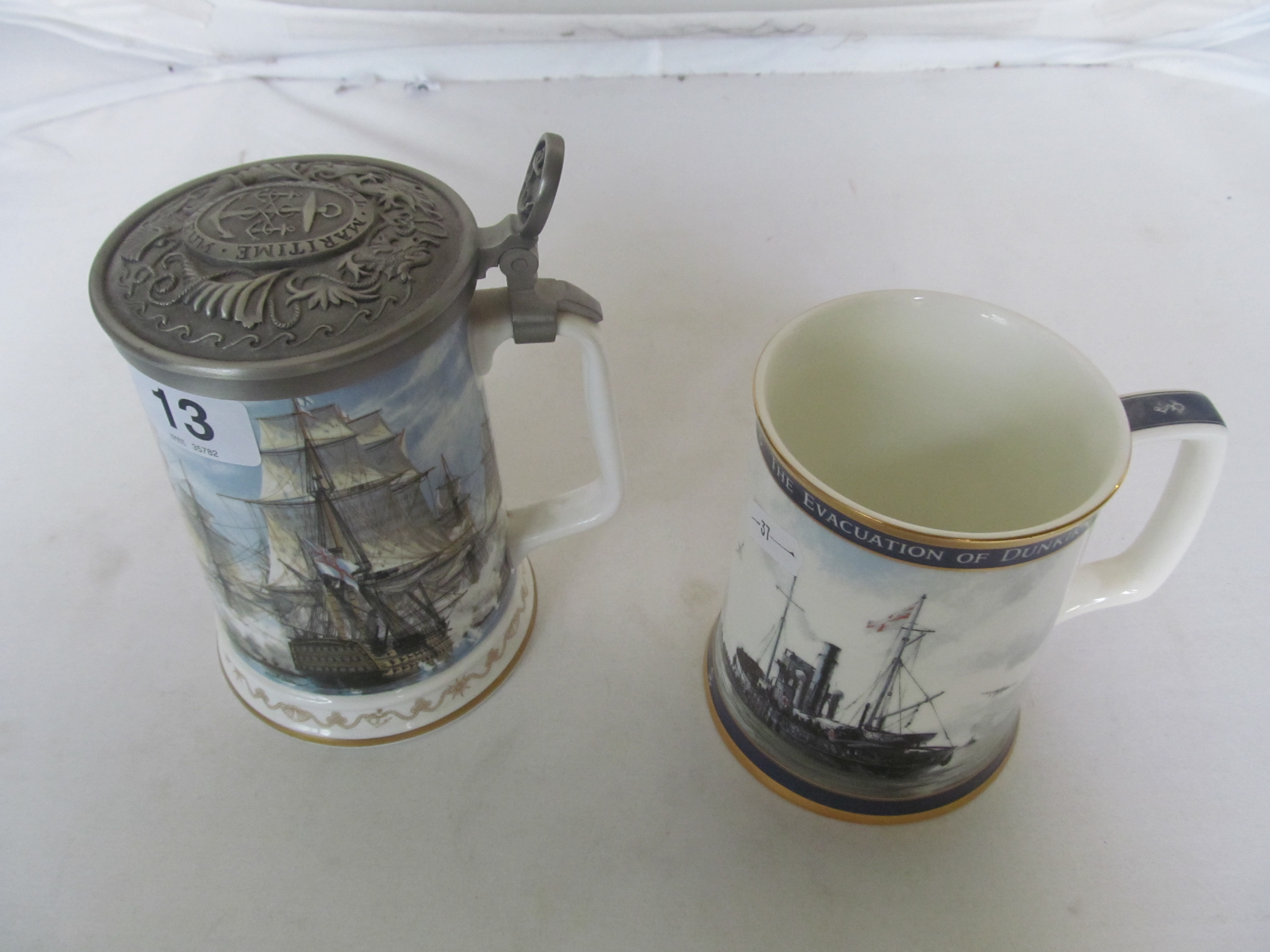 A Royal Doulton limited edition Dunkirk tankard by Geoff Hunt and a Royal Worcester Nelson's Victory