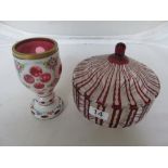 A Ruby flash glass bowl and cover and an overlay vase.