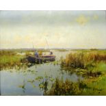 A J. Zwart oil boat on the river