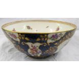 A Worcester style large bowl, blue scale pattern decorated reserves of exotic birds the interior