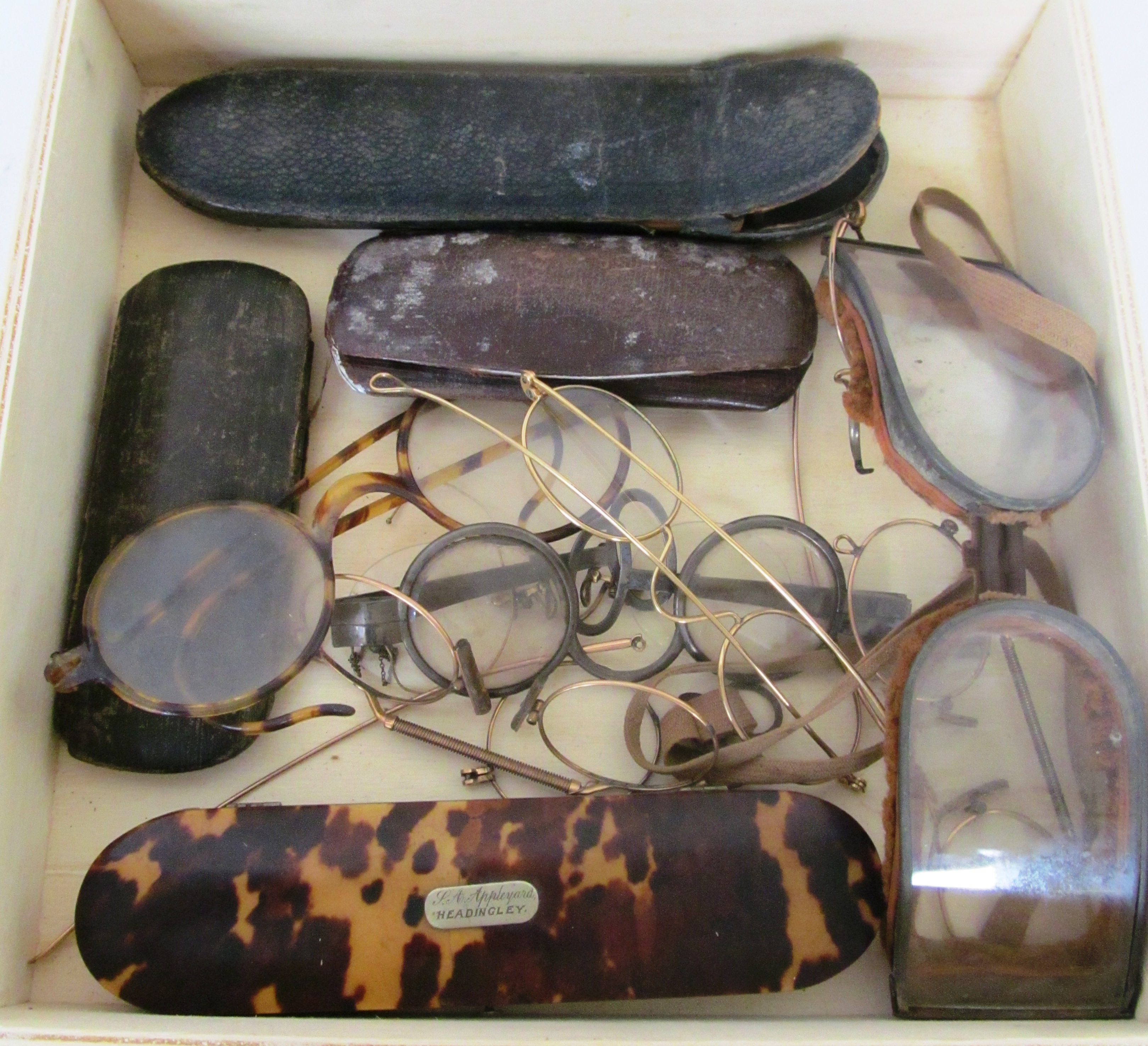 A pair of early 19th Century possibly gold frame spectacles in tortoiseshell case and quantity of