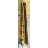 A New Hebrides carved fertility stick and three other sticks