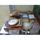 Various compacts and a travelling inkwell