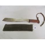An Army knife in canvas scabbard