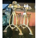 A pair Art Nouveau brass fire dogs