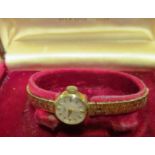 A 9ct gold Longines watch