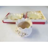 A Belleek bowl and two dishes.