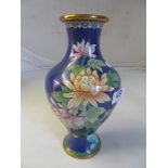 A cloisonné vase blue ground and floral design