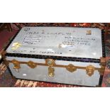 A vintage metal travelling trunk