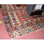 A 330cm x 265cm Kilim carpet