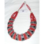 A Nepalese red bead and metal neck collar