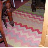 A 340cm x 178cm - multi-colour zigzag pattern North African rug