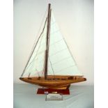 Shamrock 1930, a good wooden model yacht, from the America's cup collection, measuring 39" tall,