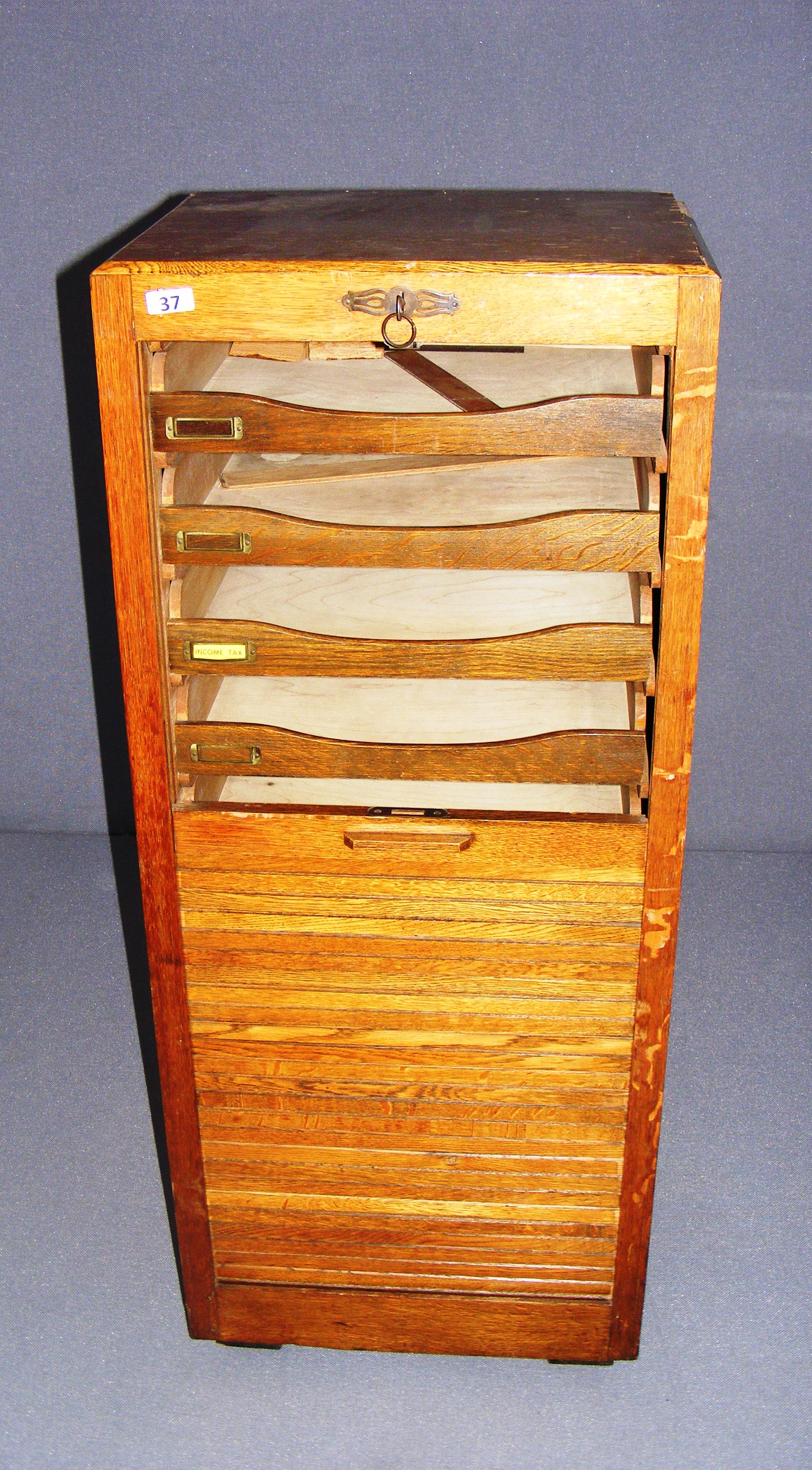 Art Deco, a 1920's / 1930's tambour filing cabinet, made from solid oak,