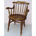 Victorian, a spindle back, Windsor style chair, standing on turned legs, measuring 25" wide.