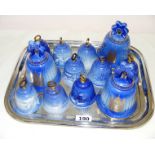 A tray of Royal Copenhagen porcelain bells.