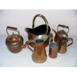 A quantity of assorted copper wares including kettles, jugs, a coal bucket etc.