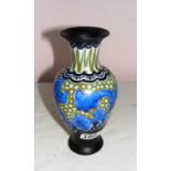 A Gouda pottery vase of unusual style with various bas markings in good condition.