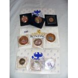 Various cased coin collections.