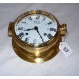 FCC Precision, a brass nautical wall clock measuring 6.5" in diameter.