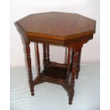 Victorian, an octagonal occasional table with a bird cage under frame and turned legs,