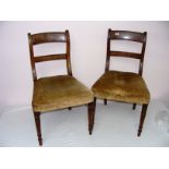 A pair of Victorian dining chairs.