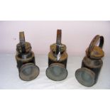 Three vintage railway lamps, one marked LNER Loco, another marked B.