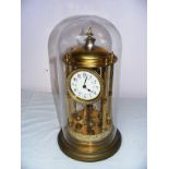 A brass dome clock, the dome measuring 17" tall, untested, cosmetically in good condition.