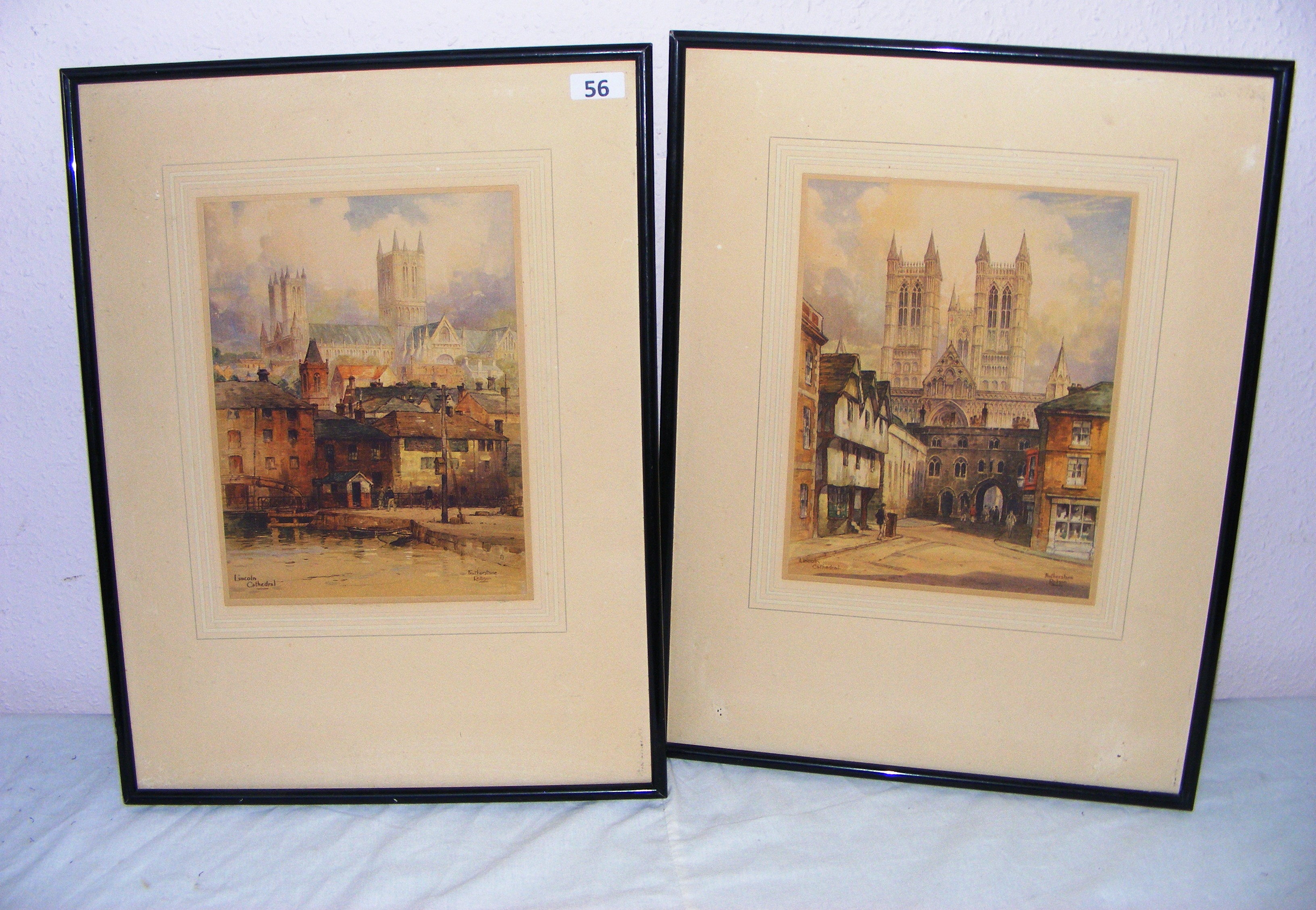 Featherstone Robson (1880-1936), a pair of etchings depicting Lincoln Cathedral, measuring 11" x 8",