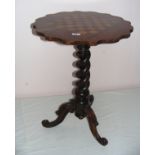 A Victorian chess table with a barley twist stem on tripod cabriole legs with reverse finial.