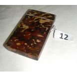 A Victorian tortoise shell card case with a hinged lid, measuring 10cm long.