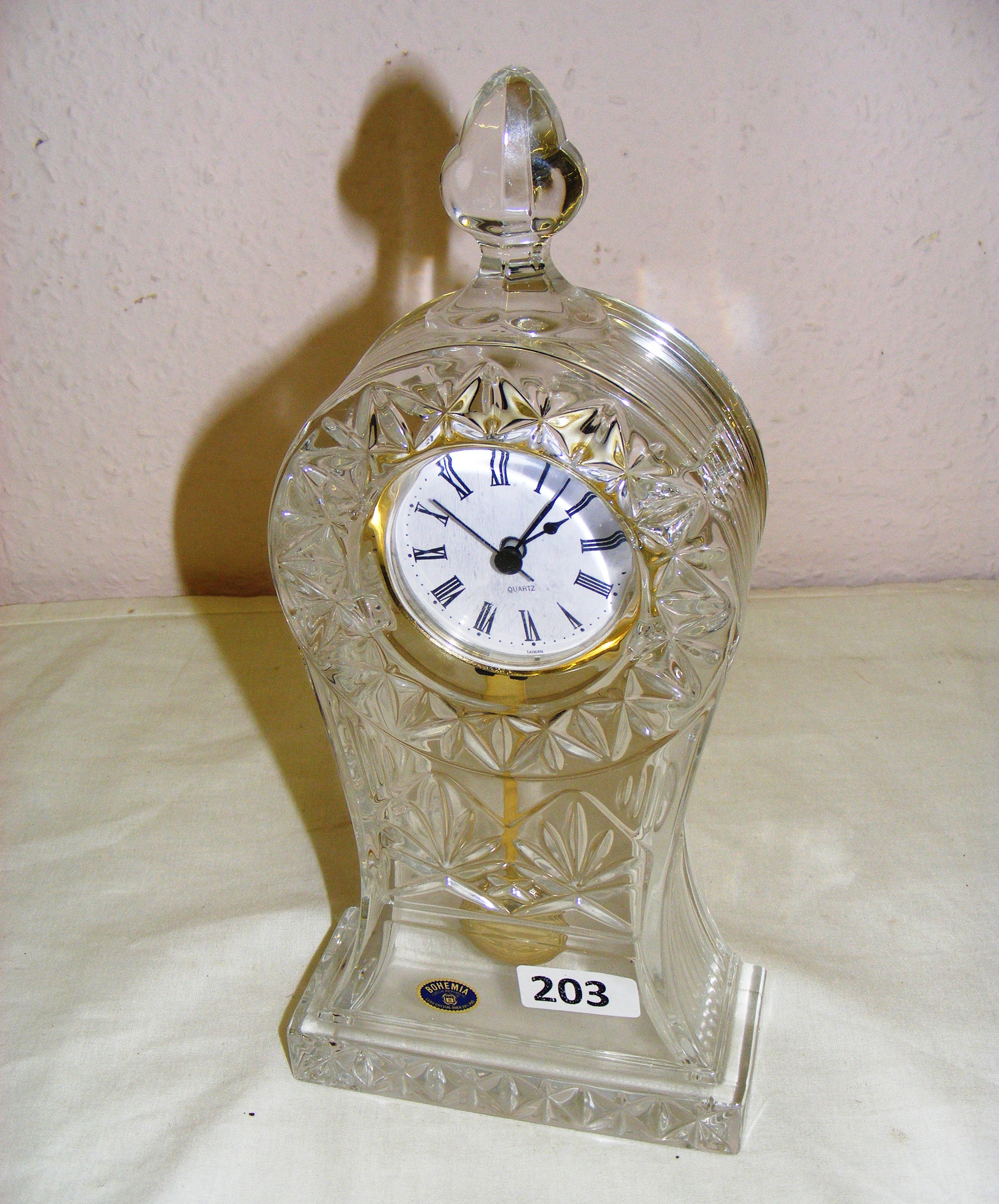 A Bohemia lead crystal mantle clock measuring 30cm tall.