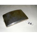 A sterling silver cigarette case, hallmarked for Birmingham 1917 by H V Pithey & Co,