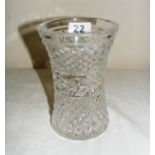 A decorative crystal vase in the Waterford style but unmarked, measuring 6" tall.