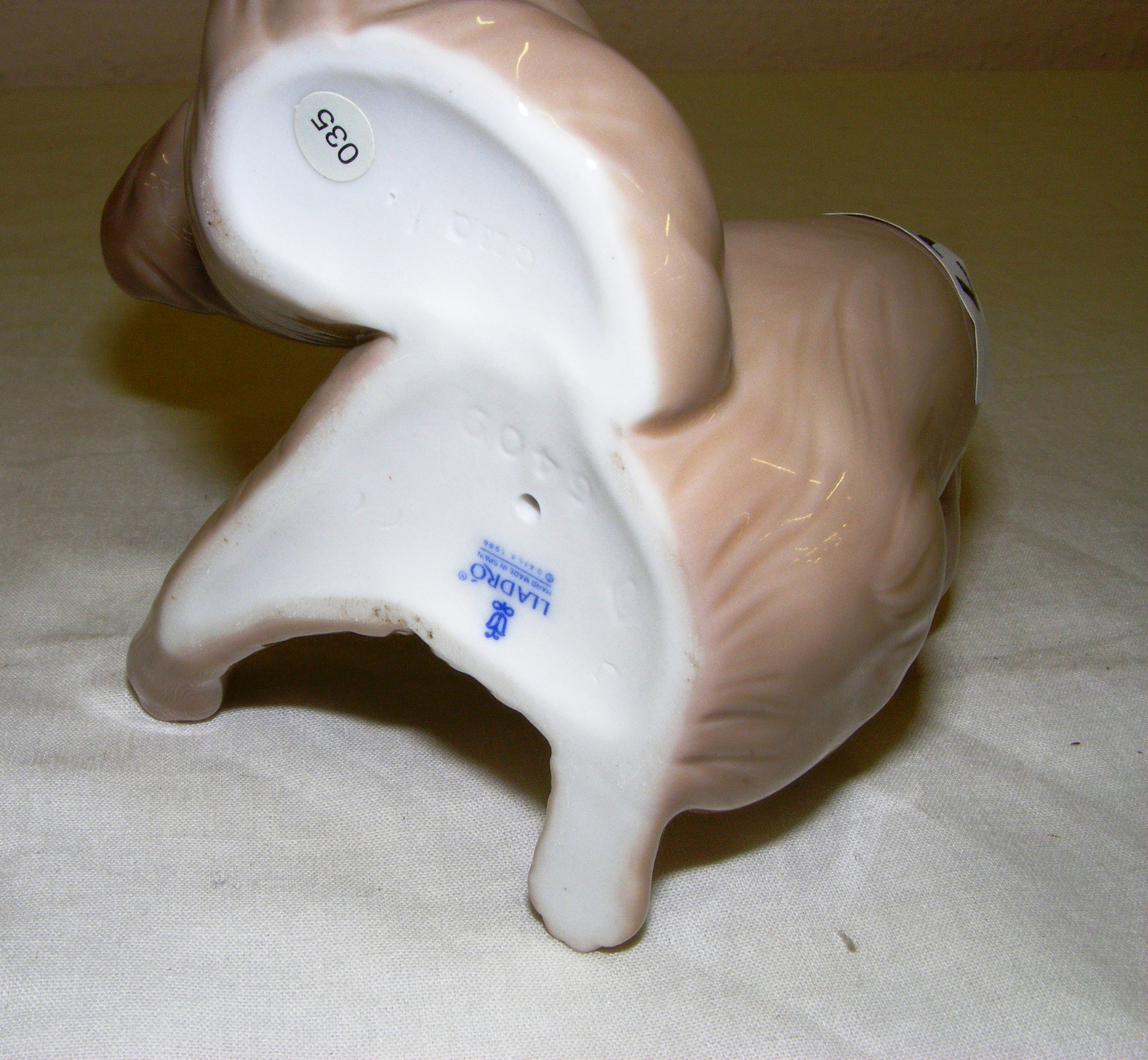 A Lladro figurine entitled "A Surprise Visit", #6409, measuring 5.25" tall, without original box. - Image 3 of 3