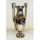 A large twin handled silver plated WMF vase of typical Art Nouveau design measuring 15.