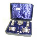 A sterling silver cruet set hallmarked for Birmingham 1912 & 1913,