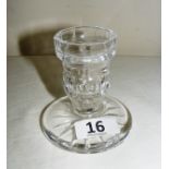 A Waterford Crystal squat candlestick, acid marked to the base "Waterford", measuring 3.5" tall.