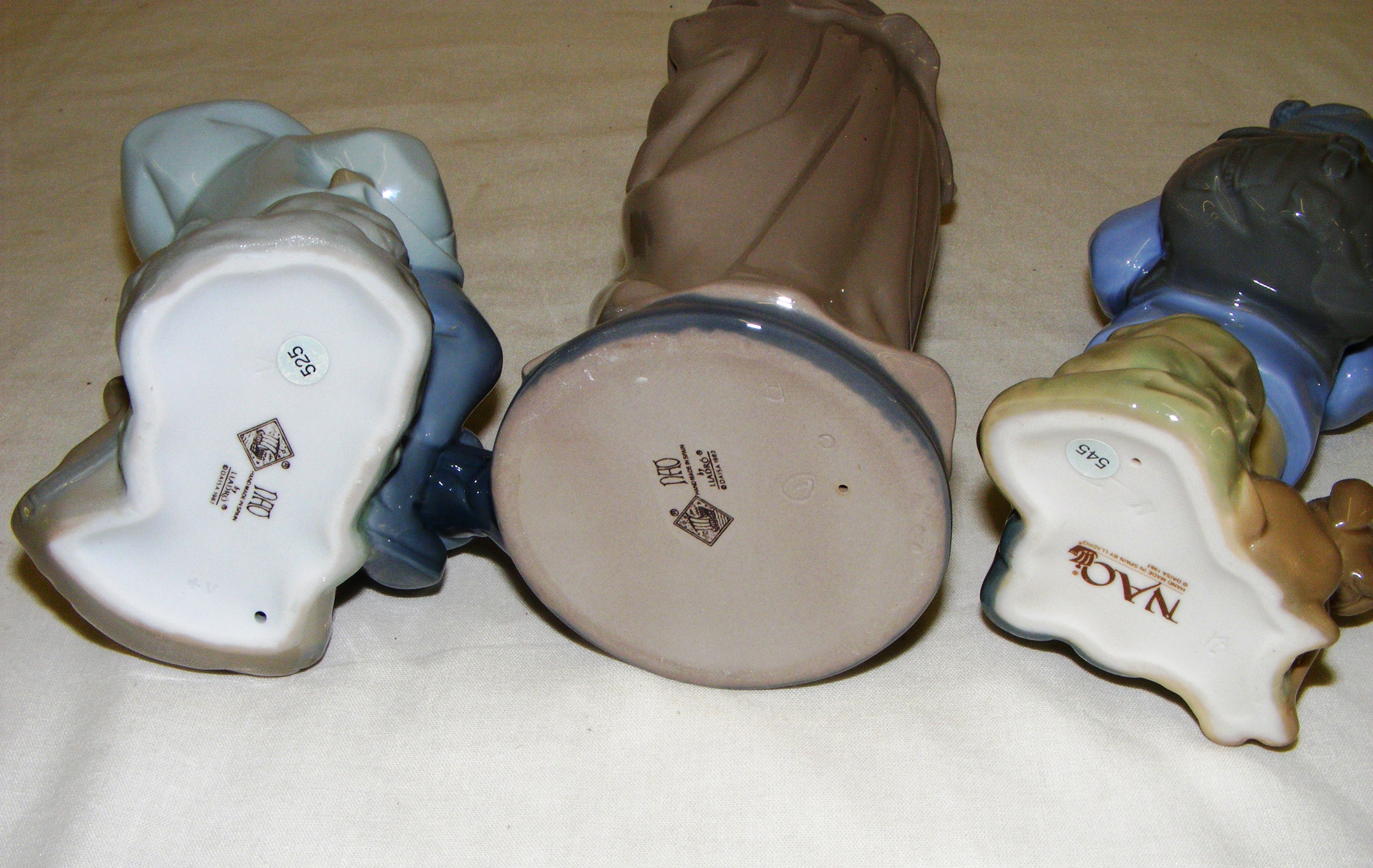 Three porcelain Nao figurines including a boy with a dog hiking, - Image 3 of 3