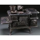 A FINE CHILD'S CAST IRON “RIVAL” TOY COOKSTOVE