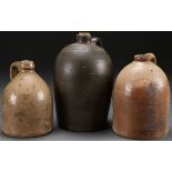 A GROUP OF THREE AMERICAN STONEWARE JUGS, 19TH C