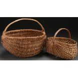 A PAIR OF WOVEN BASKETS, 20TH CENTURY