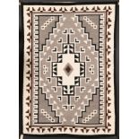 A SOUTHWEST NAVAJO “TWO GRAY HILLS” HANDWOVEN RUG