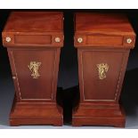 A PAIR OF BRONZE MOUNTED MAHOGANY PEDESTALS